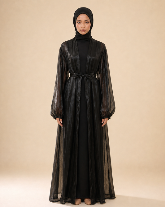Veyora Layla open abaya in black silk-touch satin, worn open with a self-fabric tie belt and matching black shayla over a plain black inner dress