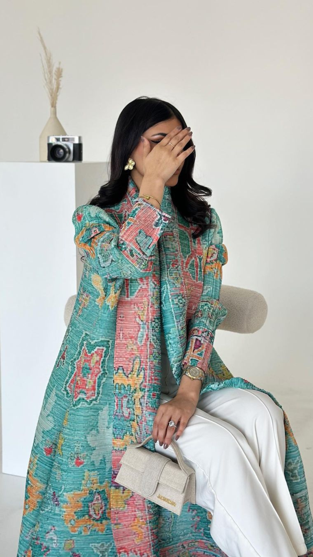 Vogue عباية الطاووس