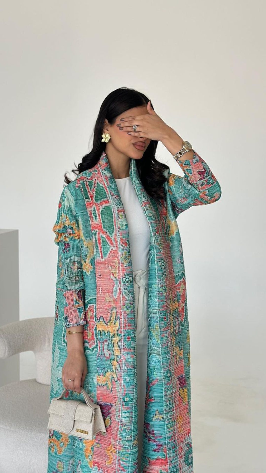 Vogue عباية الطاووس