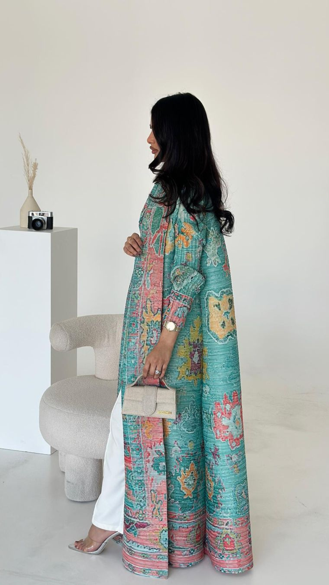 Vogue عباية الطاووس