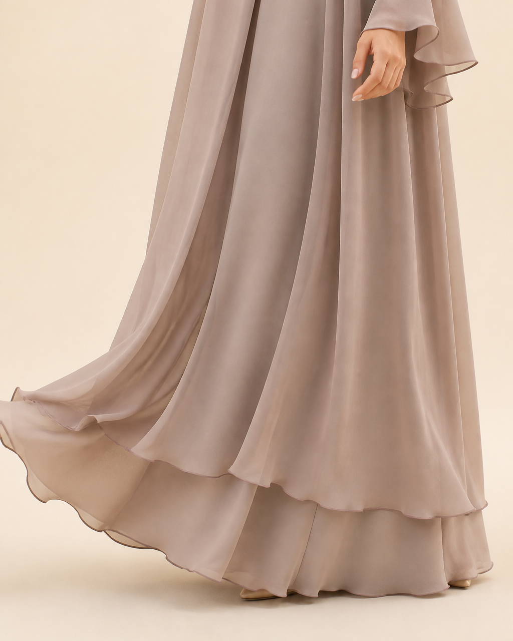 Tiered double hem with soft scalloped edge on the Hana open abaya in taupe