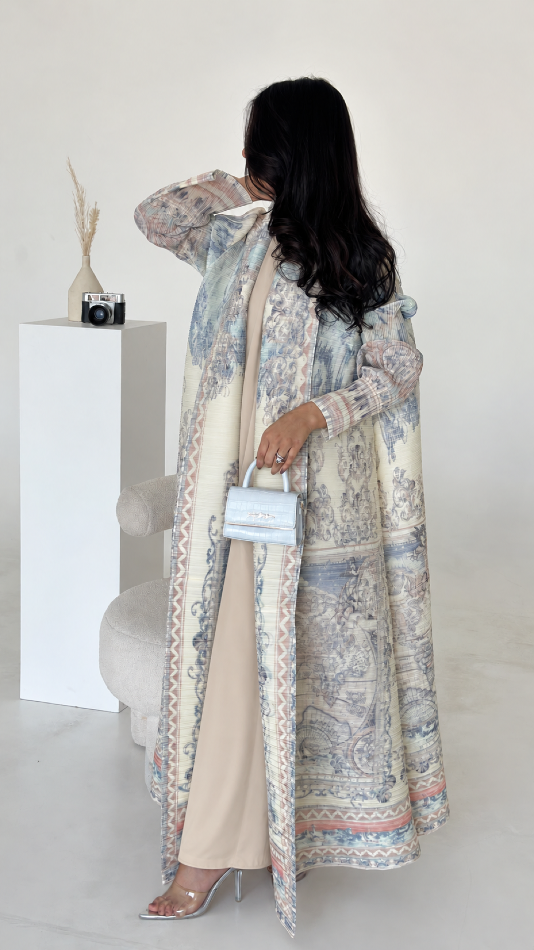 Beige Essential Inner Dress worn under an open printed abaya