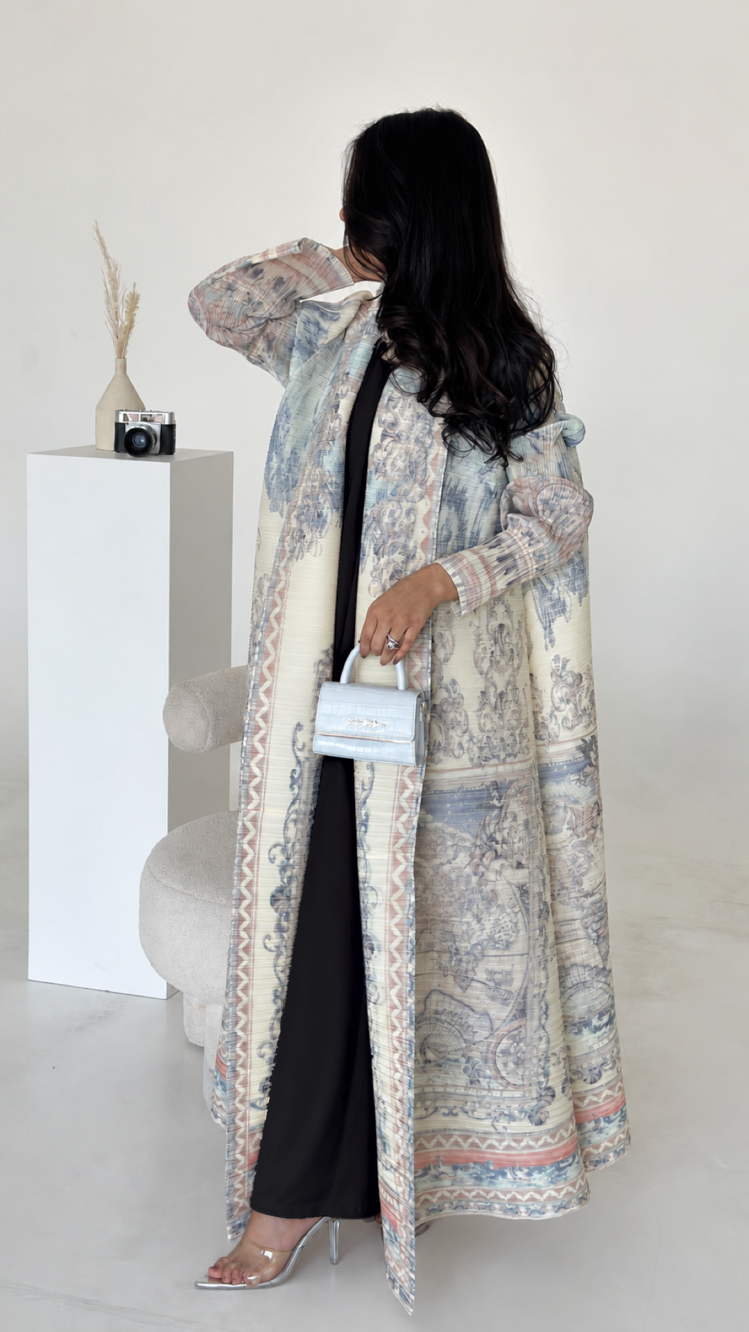 Black Essential Inner Dress worn under an open printed abaya