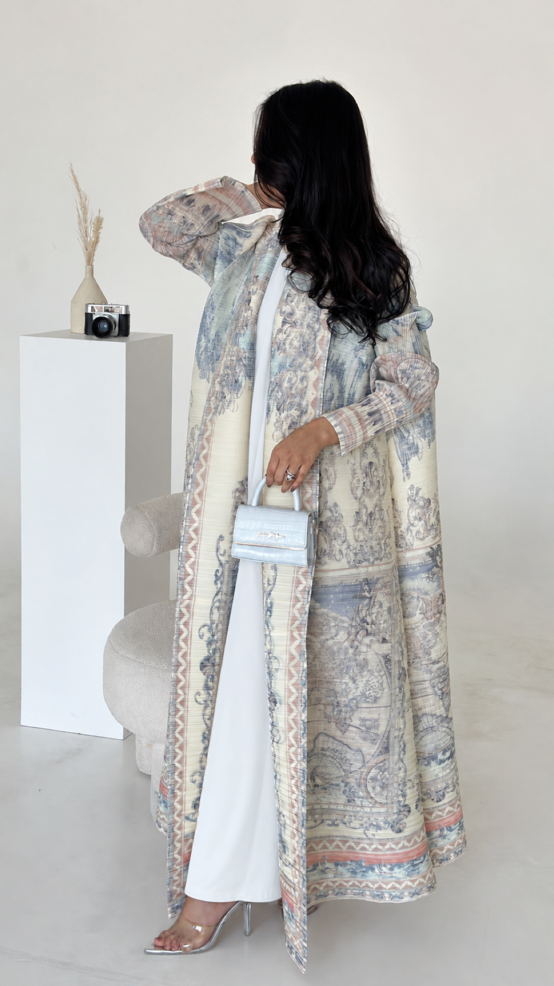 White Essential Inner Dress worn under an open printed abaya