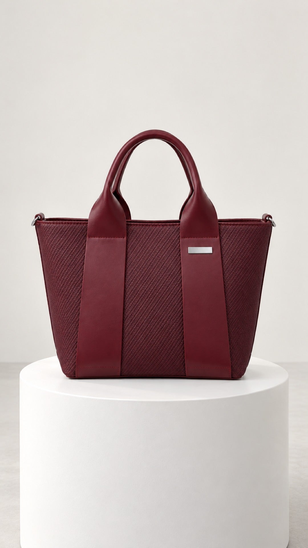 Reem Top-Handle Bag in wine, front view