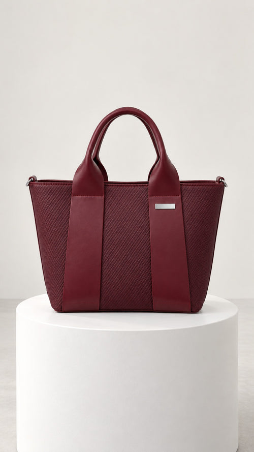 Reem Top-Handle Bag in wine, front view